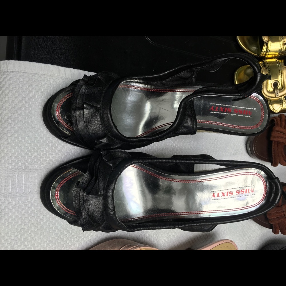 Black leather wedges